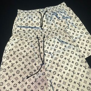 Louis Vuitton Signature Swim Board Shorts, Men's Fashion, Bottoms, Shorts  on Carousell